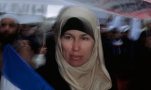 A French Muslim demonstrates against the banning of headscarves.