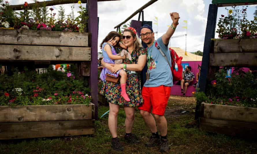 Grace with her parents Emma and Mike Ainslie