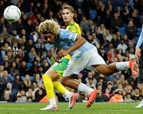 Floyd Samba opens the scoring for Manchester City against Norwich