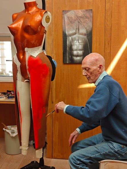 Allen Jones paints the leather skirt attached to the breastplate.