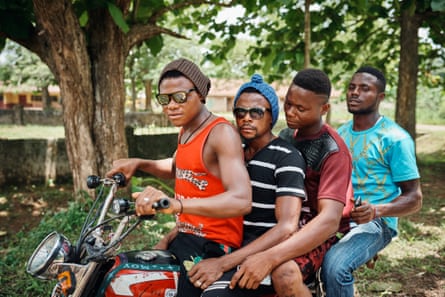 Cameroonian refugees on a motorbike