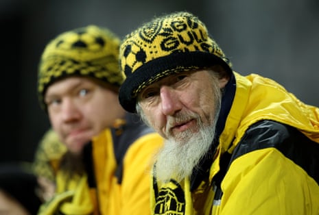 A couple of Bodo/Glimt wait for kick-off at the Aspmyra Stadion.