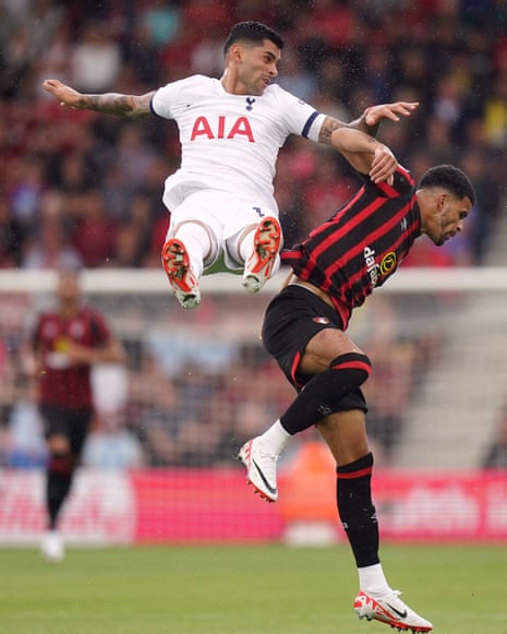 Bournemouth's Dominic Solanke and Tottenham Hotspur's Cristian Romero challenge for the ball in the air.