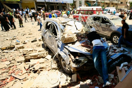 Emergency services and local people at the scene of an airstrike in the town of Nabatieh, southern Lebanon on 27 June 2025.