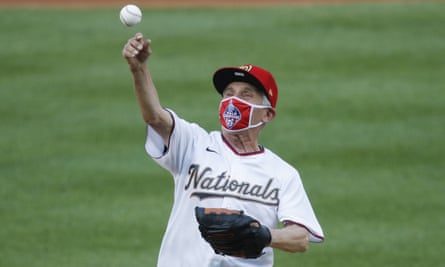 Anthony Fauci throws the ceremonial first pitch before the start of the opening day baseball game between the New York Yankees and Washington Nationals in Washington on Thursday.
