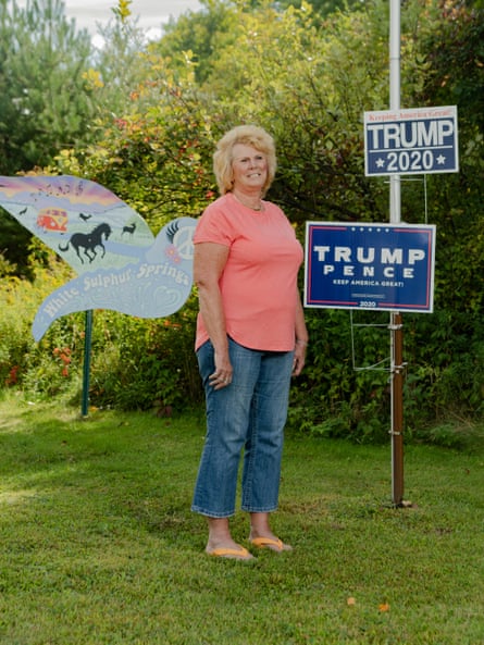 April Kissel has had four Trump placards on her lawn for the past month.