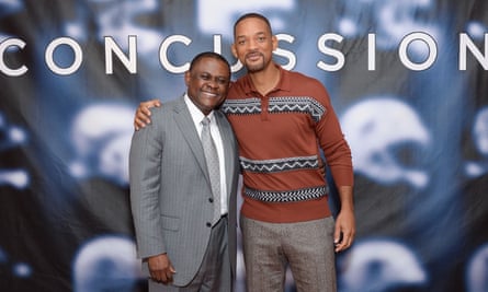 Bennet Omalu, Will Smith<br>Dr. Bennet Omalu, left, and actor Will Smith pose together at the cast photo call for the film “Concussion” at The Crosby Street Hotel on Monday, Dec. 14, 2015, in New York. (Photo by Evan Agostini/Invision/AP)
