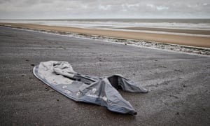 A damaged inflatable dinghy is seen on Plage du Braek, near Loon Beach in Dunkerque the day after 27 migrants died when their dinghy deflated as they attempted to cross the English Channel.
