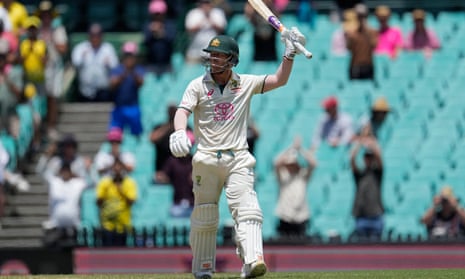 David Warner raises his bat after reaching 50 for Australia against Pakistan on day four of the third Test