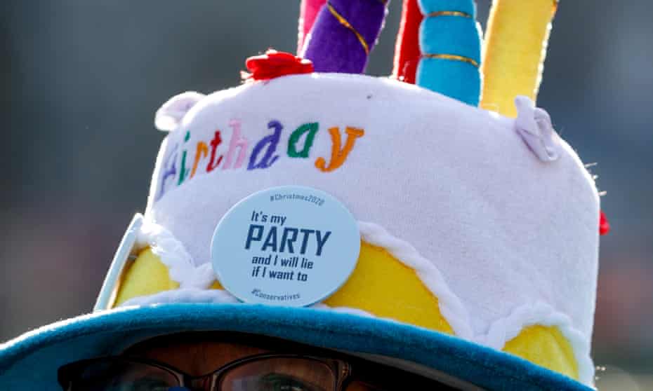 A “party” hat worn by a protester outside parliament.