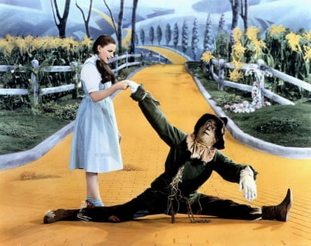 a woman and a man in costumes