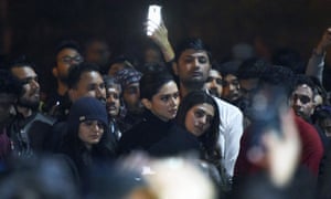 Deepika Padukone (centre) joined protesters at Jawaharlal Nehru University in Delhi, where staff and students were injured by a masked mob on Sunday.