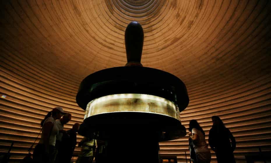More to learn … tourists look at portions of the Dead Sea scrolls on display at the Shrine of the Book in Jerusalem.