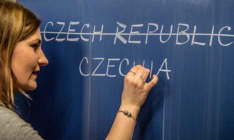 A schoolteacher writes a possible new English name for the Czech Republic on a blackboard in Prague on Thursday.