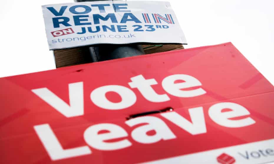 Remain and leave signs on a lamp-post in Leeds in the run-up to the EU referendum.