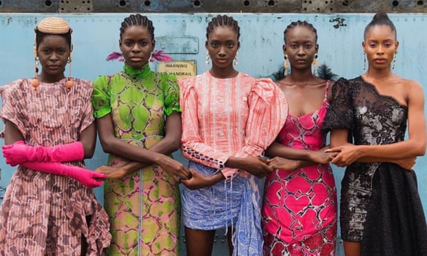Models holding hands in Lagos, Nigeria, in 2019, by Stephen Tayo.
