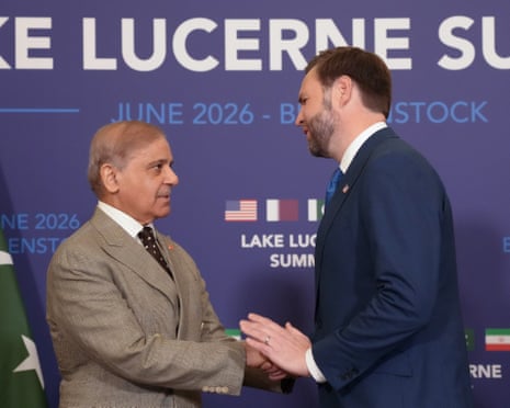 Shehbaz Sharif and JD Vance shake hands