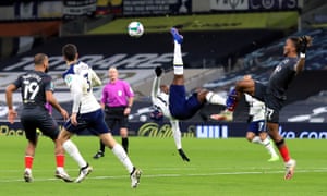 Tanguy Ndombele beats Brentford’s Ivan Toney as Tottenham defended their lead.