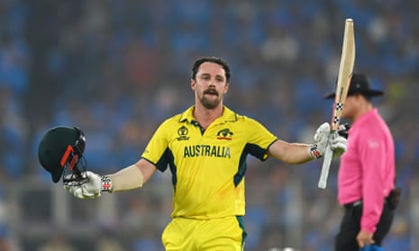 Travis Head celebrates his hundred.