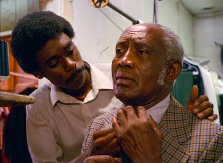 two men sitting together