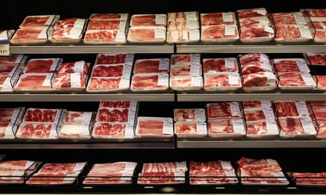 Supermarket shelves with packed meats