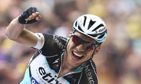 Germany’s Tony Martin celebrates as he crosses the finish line to win the fourth stage of the Tour de France.