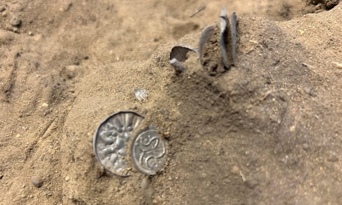Hoard of 1,000-year-old Viking coins unearthed in Denmark | Archaeology | The Guardian