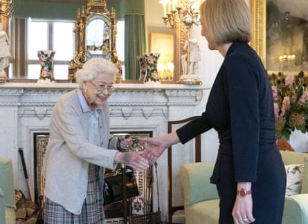 Queen Elizabeth shaking Liz Truss’s hand.