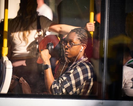 Metrolink tram passengers in Manchester as the temperature in the city hit 30C.