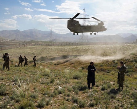 A US military Chinook helicopter lands on a field in Afghanistan in 2019.