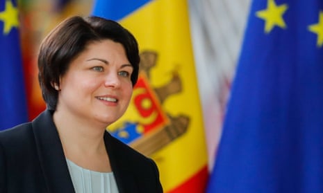 Natalia Gavrilița, prime minister of Moldova, next to Moldova and EU flags