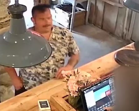 A CCTV still of James Desborough at the bar in a pub