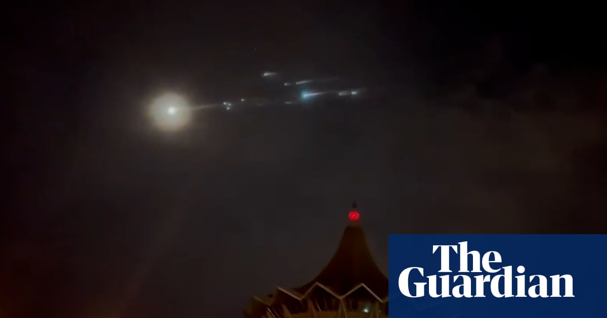 ‘We thought it was a shooting star’: uncontrolled Chinese rocket fragments seen in Malaysia – video