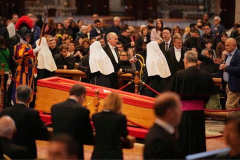 People pay respects at St Peter’s Basilica as Francis lies in state