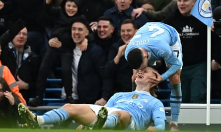 Erling Haaland celebrates his goal with Phil Foden