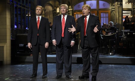 … Donald Trump (centre) guest hosts Saturday Night Live in 2015.