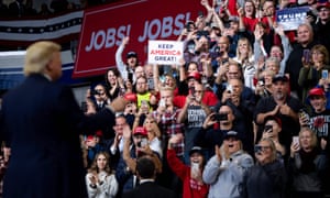 Donald Trump arrives at a campaign rally in Des Moines, Iowa.