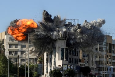 The top floors of a high building explode