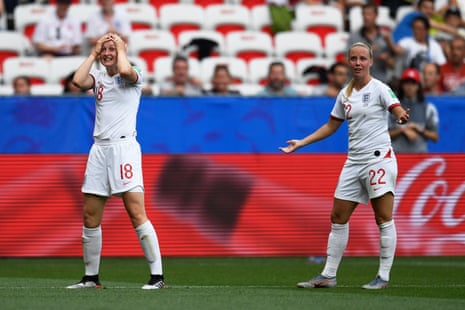 England’s forward Ellen White (L) reacts after a goal was ruled offside.