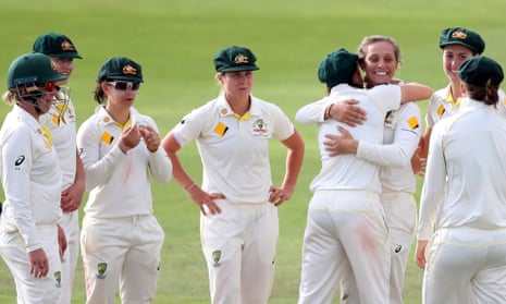 Australia’s Ashleigh Gardner celebrates with team mates after taking the wicket of England’s Katherine Brunt.