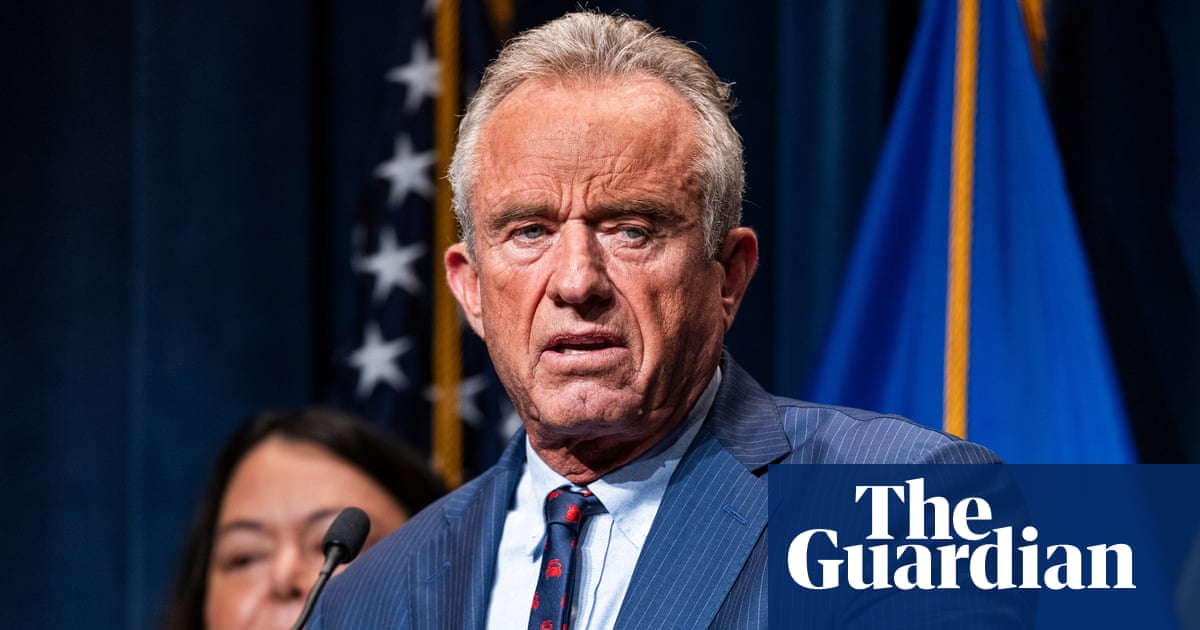 RFK Jr at a podium insisting the outbreak is under control, while an invisible, underfunded CDC quietly screams in the background.