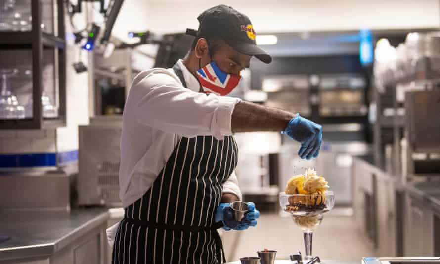 A chef in the kitchen of the Hard Rock Cafe in Piccadilly Circus, London