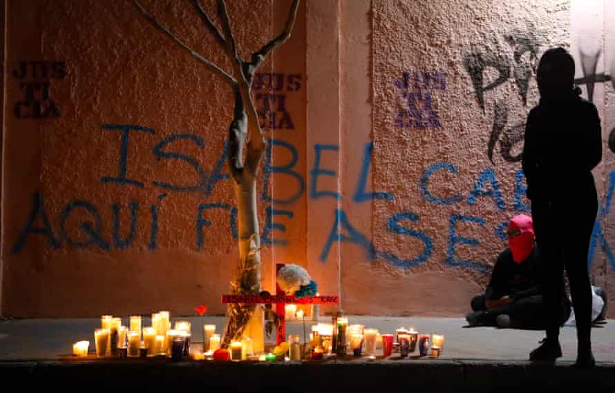 Activists place candles during a protest against femicides in Ciudad Juarez and the murder of 26-year-old artist, activist and feminist Isabel Cabanillas de la Torre, also killed in the city, in Ciudad Juarez, in the state of Chihuahua, Mexico, on January 25, 2020.