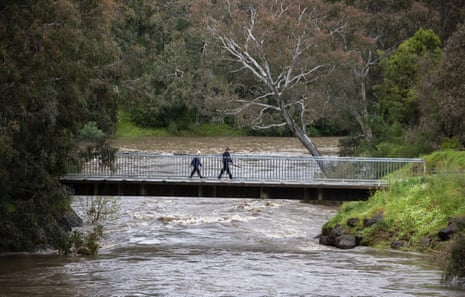 Heavy rain has caused high water levels, where the Merri Creek meets the Yarra River above Dights Falls in Abbotsford.