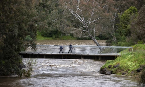 Heavy rain has caused unusually high water levels, such as in this photo where the Merri Creek meets the Yarra River above Dights Falls in Abbotsford, Melbourne.