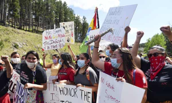 Protesters on the road leading to Mount Rushmore, where Donald Trump gave a speech in July 2020.