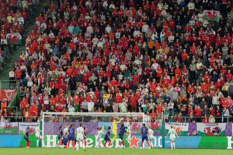The Welsh fans look connected arsenic a Wales area heads into nan French punishment area.