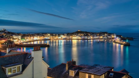 Harbour in Cornwall lit up at night