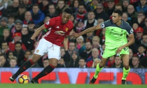 Manchester United’s Anthony Martial, left, prepares to take on Trent Alexander-Arnold of Liverpool in this month’s 1-1 draw.