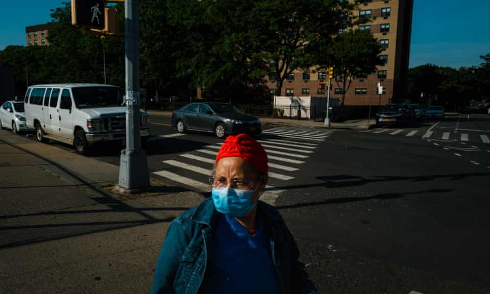 A woman wearing a mask in Corona, Queens.